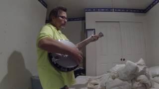 "Anything" - Robert Trudell Junior & Elvis regale the crowd playing on his bedside tabled Banjo