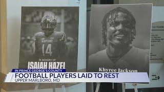 Football players laid to rest