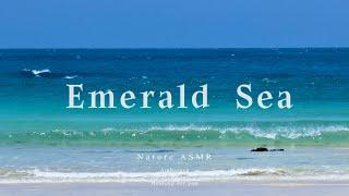 The cool waves of the emerald sea.