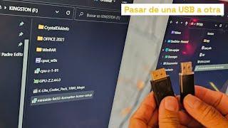 Cómo pasar archivos de una memoria USB a otra ?