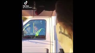 Michael Myers freaks lady out at stoplight. She reaches for something....