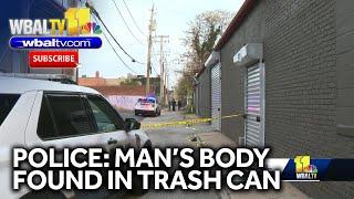 Police: Man's body found in trash can