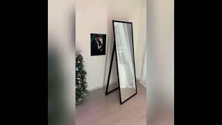 Напольное зеркало в чёрной раме