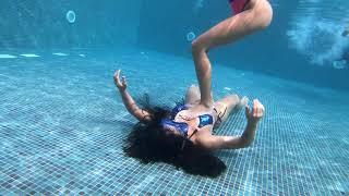 Underwatee mask breath hold at the bottom of the swimming pool my girl pushed me