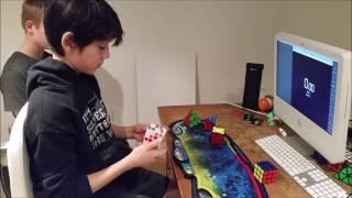 Ben Kyle solves 5 different rubic's cubes in a minute 54 seconds