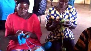 Women of the Acholi Quarter knitting & crocheting