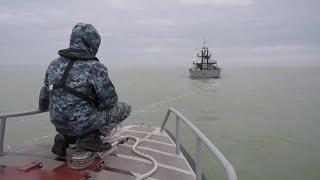 Ukrainian border guards patrol on Azov Sea amid tensions with Russia | AFP