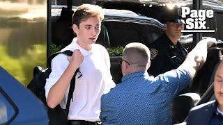 Barron Trump, 18, flanked by security as he arrives at NYU for first day of college classes