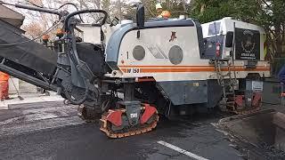 Milling work being done by WILDCAT STRIPING, SEALING AND PAVING