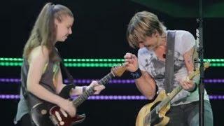 Keith Urban Pulls 19-Year-Old Girl Out of the Crowd to Play Guitar