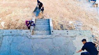 A scene of love and effort; concreting the stairs of the house with the hands of Ibrahim and Soghra