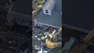 Dump truck crashes into New Jersey house