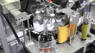 HERMA 132M HC - Wrap-around labelling machine for glass bottles