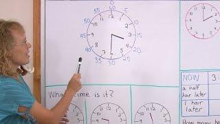 Tell time to the whole and half hours - minute hand introduced