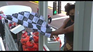 F1 Monaco - Serena Williams struggling to wave the chequered flag.