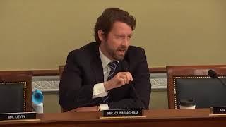 U.S. Rep. Joe Cunningham, D-SC blows an air horn in hearing