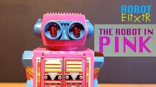 The Robot in Pink - Super Astronaut Robot by Lucky Star. Walking toy robot with guns.