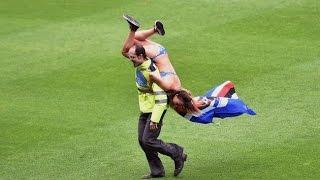 Southampton FC steward gives a celebrating LFC fan WWE skill