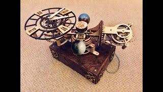 Astronomia. A three axis tourbillon clock made of wood