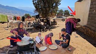 A good day: Akram plasters and cooks beside her children