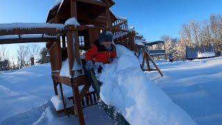 SLIDING DOWN OUR SNOWY SLIDE