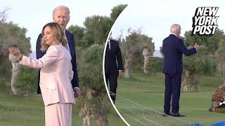Biden appears to wander off at G7 summit before being pulled back by Italian PM