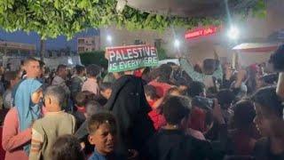 Celebrations outside Al Aqsa Hospital in Deir al-Balah after Hamas accepts cease-fire proposal