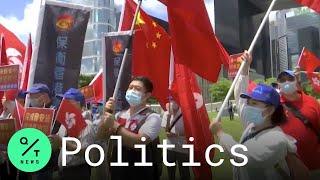 Pro-Beijing Supporters Hail 'Hong Kong's Return to China' After Security Law Passes