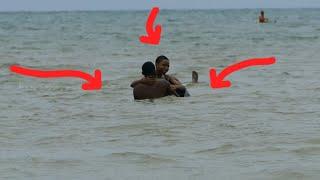 BEACH BOY HAS JUST SNATCHED A GIRL IN MOMBASA BEACH