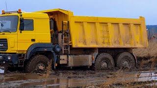 Cargo transportation through mud off road!  Heavy equipment works off road!