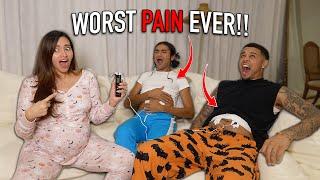 MY HUSBAND AND BROTHER TRY LABOR PAIN SIMULATOR!! KB AND KARLA