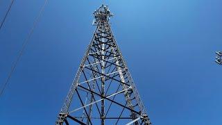 Justin Zappala is climbing a 200 foot cell tower