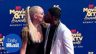 Lindsay Vonn and PK Subban share a kiss on the MTV red carpet