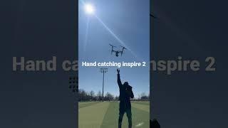 Hand catching the dji inspire 2