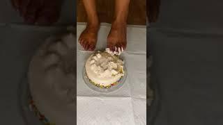 Bare feet smashing cake