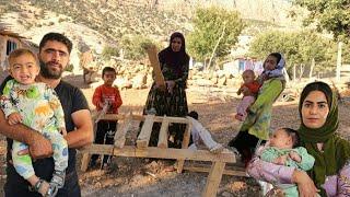 Khadija makes a wooden bed for the clothes of the hut and bathes Poya Vartan