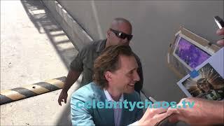 Tom Hiddleston is happy to thrill waiting fans in hollywood