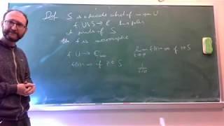 Meromorphic functions