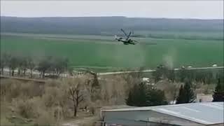 Russian Mi-8 Helicopters Under The Cover Of Ka-52 Helicopter.