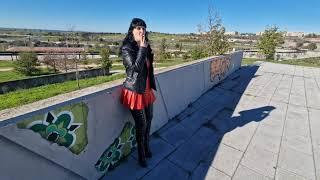 VICTORIA DEVIL- Red leather outfit, extra thigh high boots, black leather jacket walking. Smoking