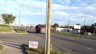 Kenworth W900L tri axle jake braking and Ford L9000 tri axle dump trucks