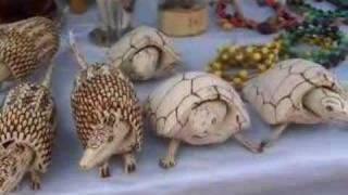 Moving carved wooden animal souvenirs in Parintins, Brazil