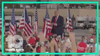 President Trump throws masks into crowd at Florida campaign rally