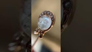 Victorian carved moonstone grumpy baby stickpin, circa 1900 – sold by karendeakinantiques.com