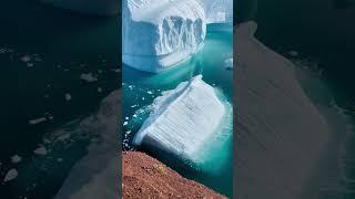 Wow! Iceberg flipping in Greenlands icy waters | #shorts #iceberg #greenland