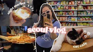 tourist things in seoul: cat cafe, myeongdong shopping, night market, kpop merch and dog cafe