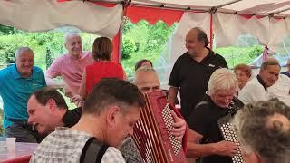 Fabrizio Cattaneo e Don Sergio Carrara a Dossena. festa ai molini 2023.canzoni popolari italian folk