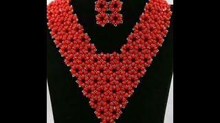 the tutorial on how to make this beautiful red and silver necklace bead