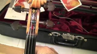 Changing Strings on a Violin by Fiddlerman