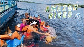 Swimming with pink dolphins in the Amazon river